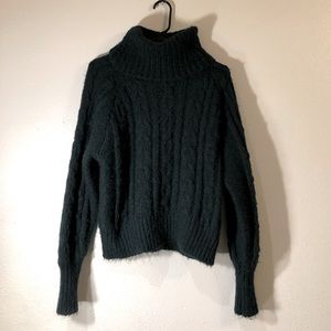 Dark green, turtleneck sweater.